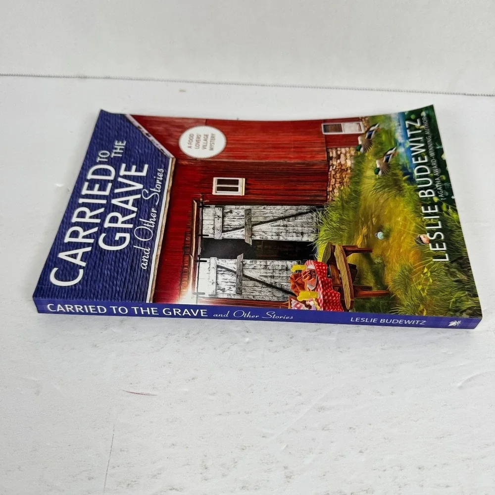 Carried to the Grave & Other Stories Leslie Budewitz 2021‎ Food Lovers Mystery